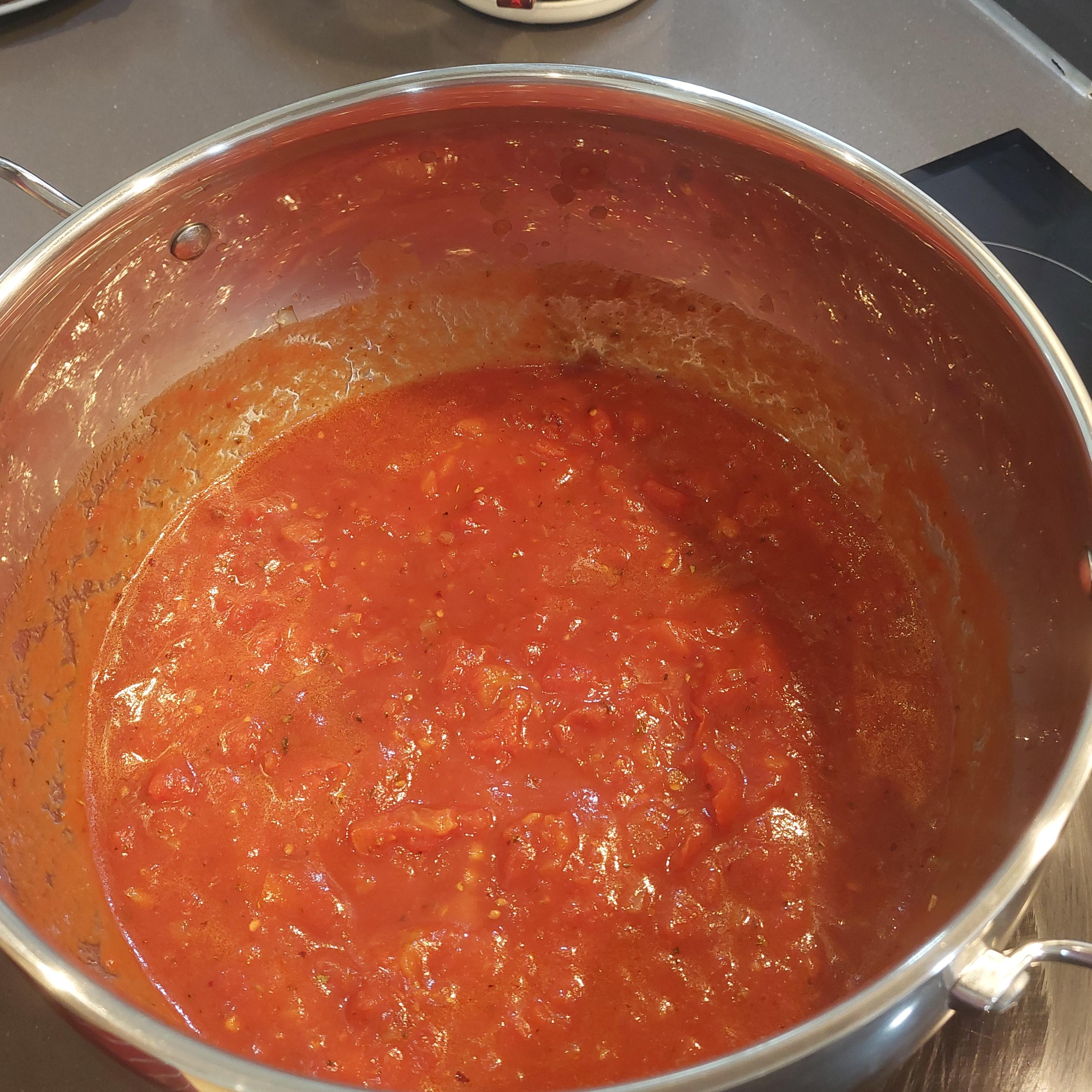 Add tinned chopped tomatoes and simmer for 10mins. Add seasoning to taste.