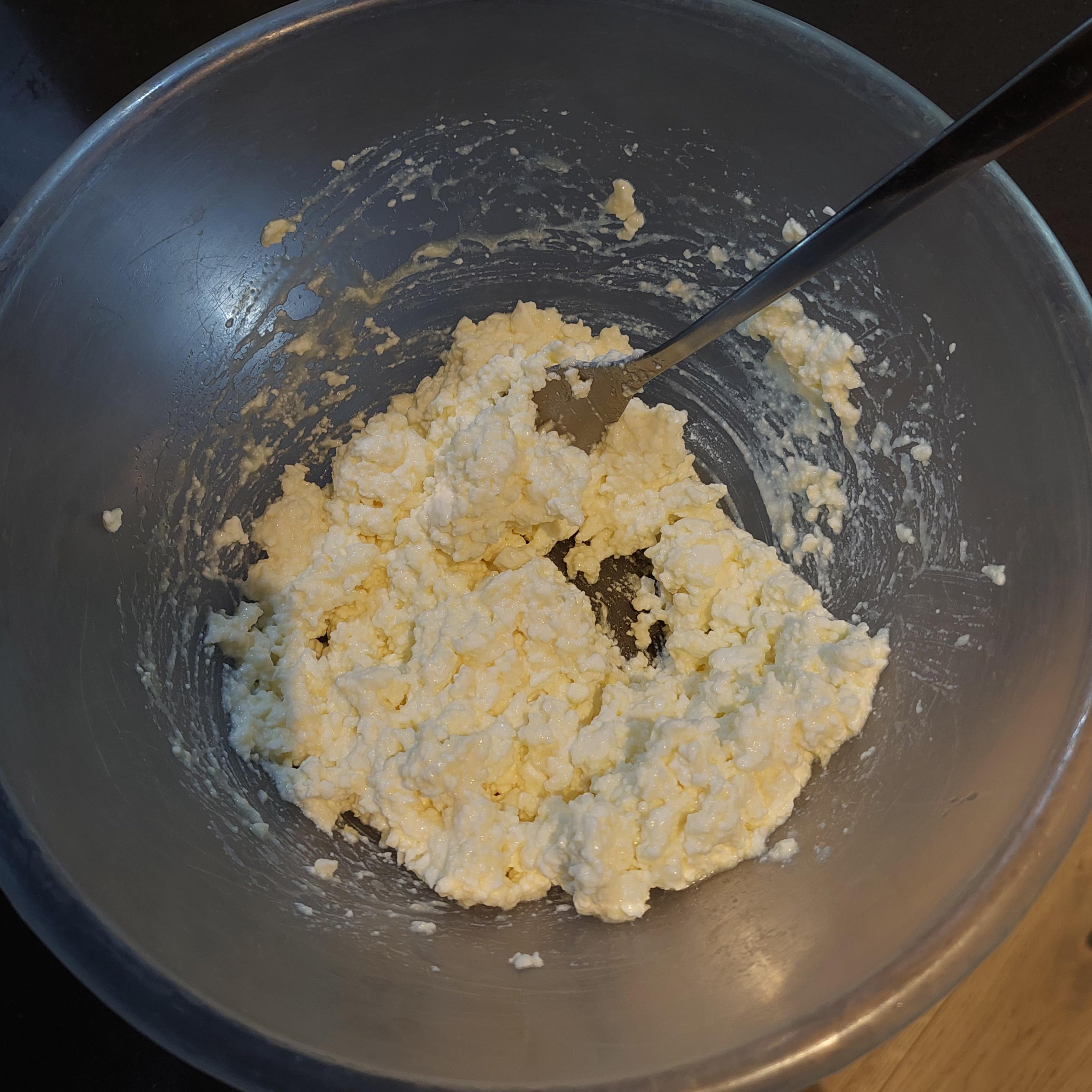 Mix curd cheese, egg and salt. Optionally, add some sugar for sweeter pancakes.