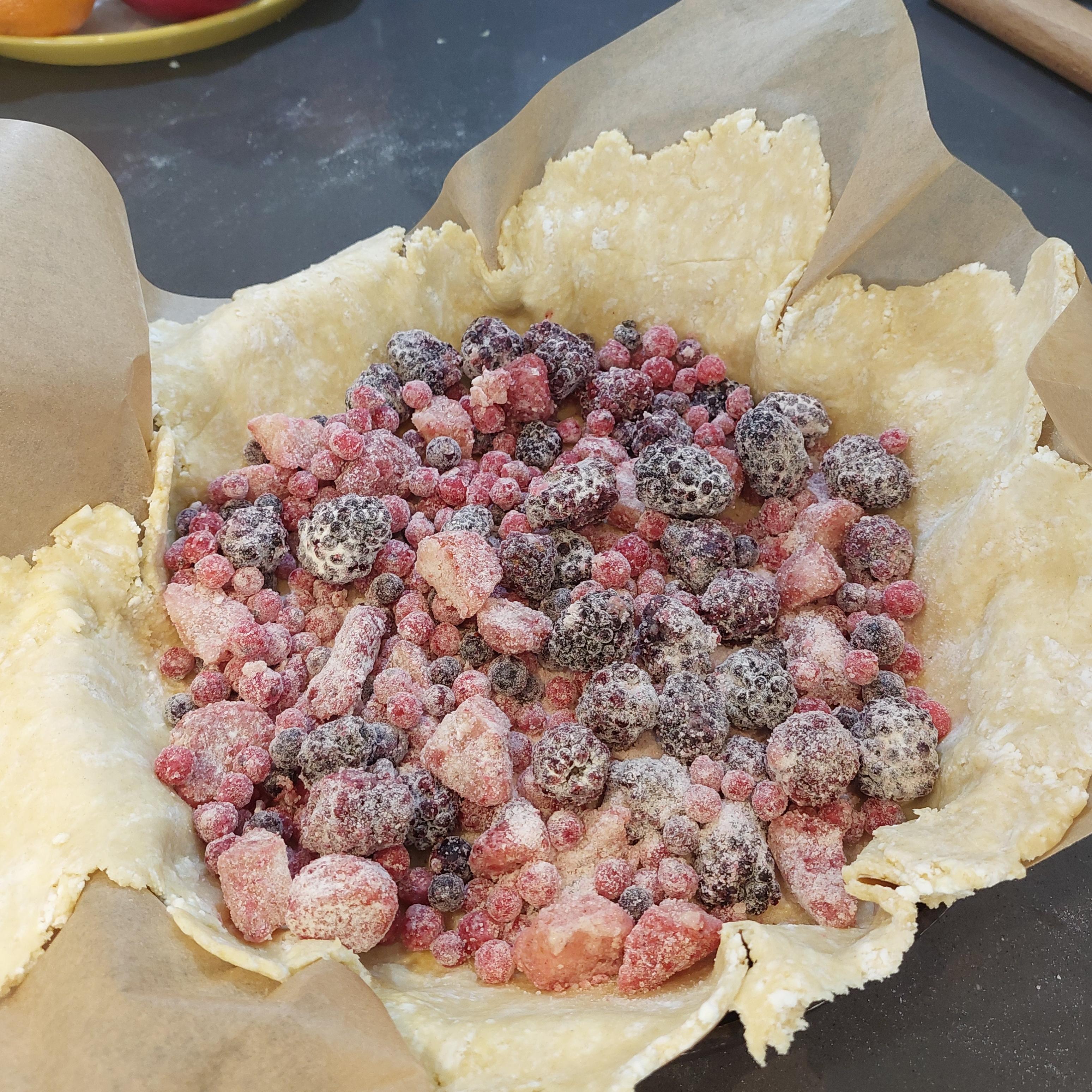 Spread berries evenly over the dough.